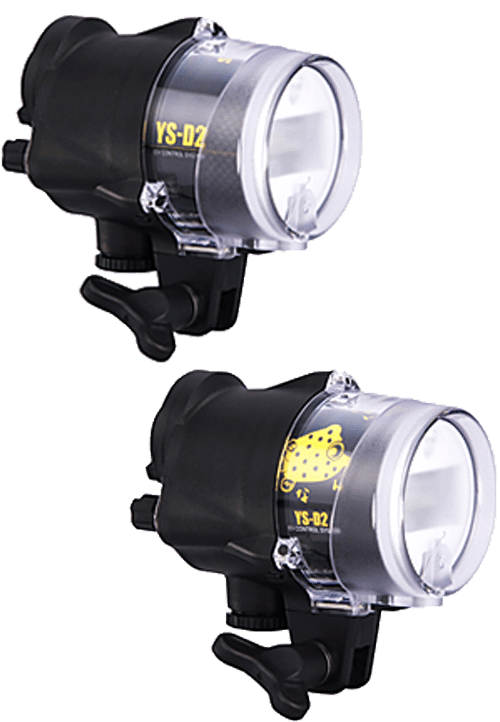 Are these the YS-D2J strobes made in Japan?Do they come wiht a US warranty?