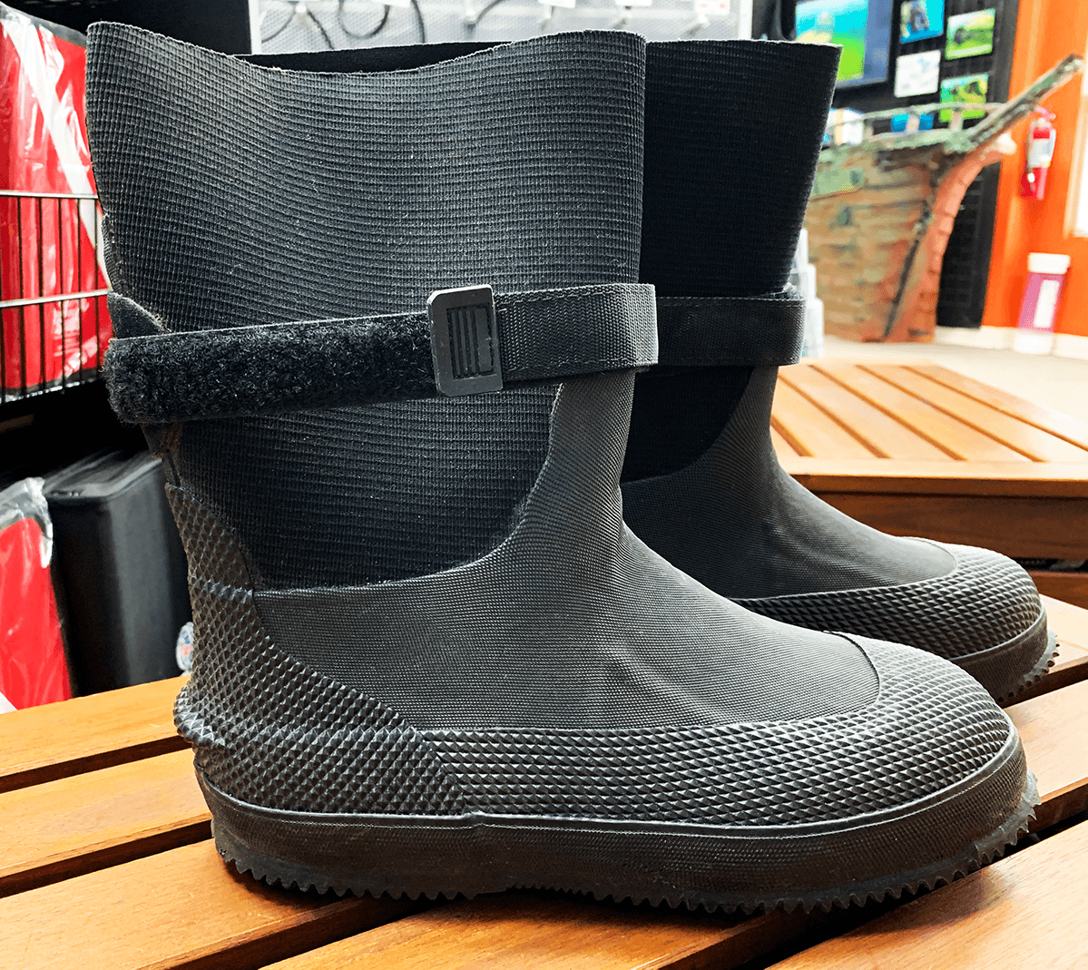 Does this boot need to be sewn into the suit or can it be glued in like a wrist seal?  Would you order a size up in shoe size?  for example I normally where a size 12 shoe, should I stick with a 12 or go to a 13 to allow for some heavy socks?Thanks