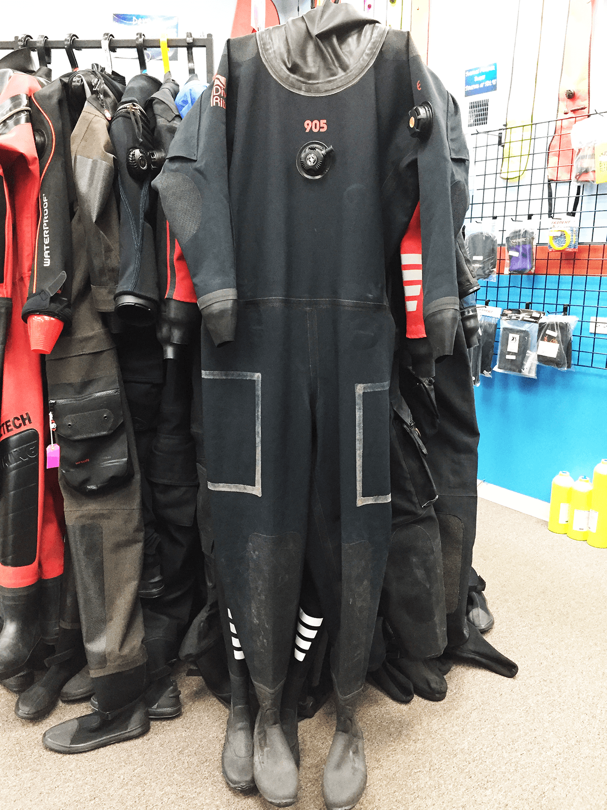 905 EXP suit what size do I need ,size 9.5/10 shoe I weigh 245lbs 5.8 in  tall .also where is the bleed valve located ? Do we have a relief valve by the crotch?